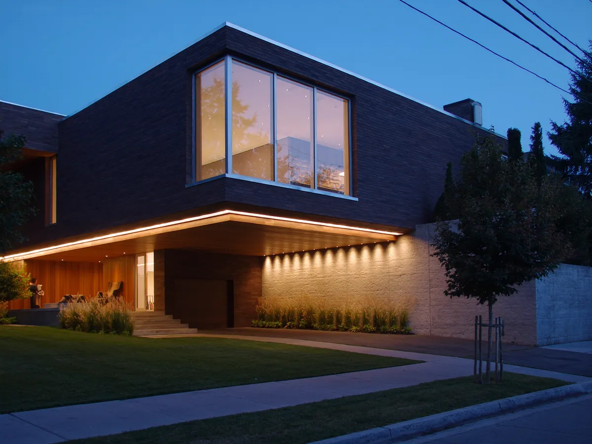 Design-build modern home in South Richvale, Richmond Hill — cantilevered second storey with charcoal brick and white oak soffits